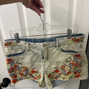 BLANK NYC floral embroidered Jean shorts.